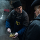 Yashar, a high-school French teacher from Crimea who now sells home-made food in the Lviv market.